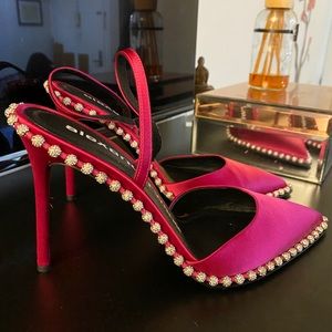 Authentic fuscia pink sling back heels. Used once